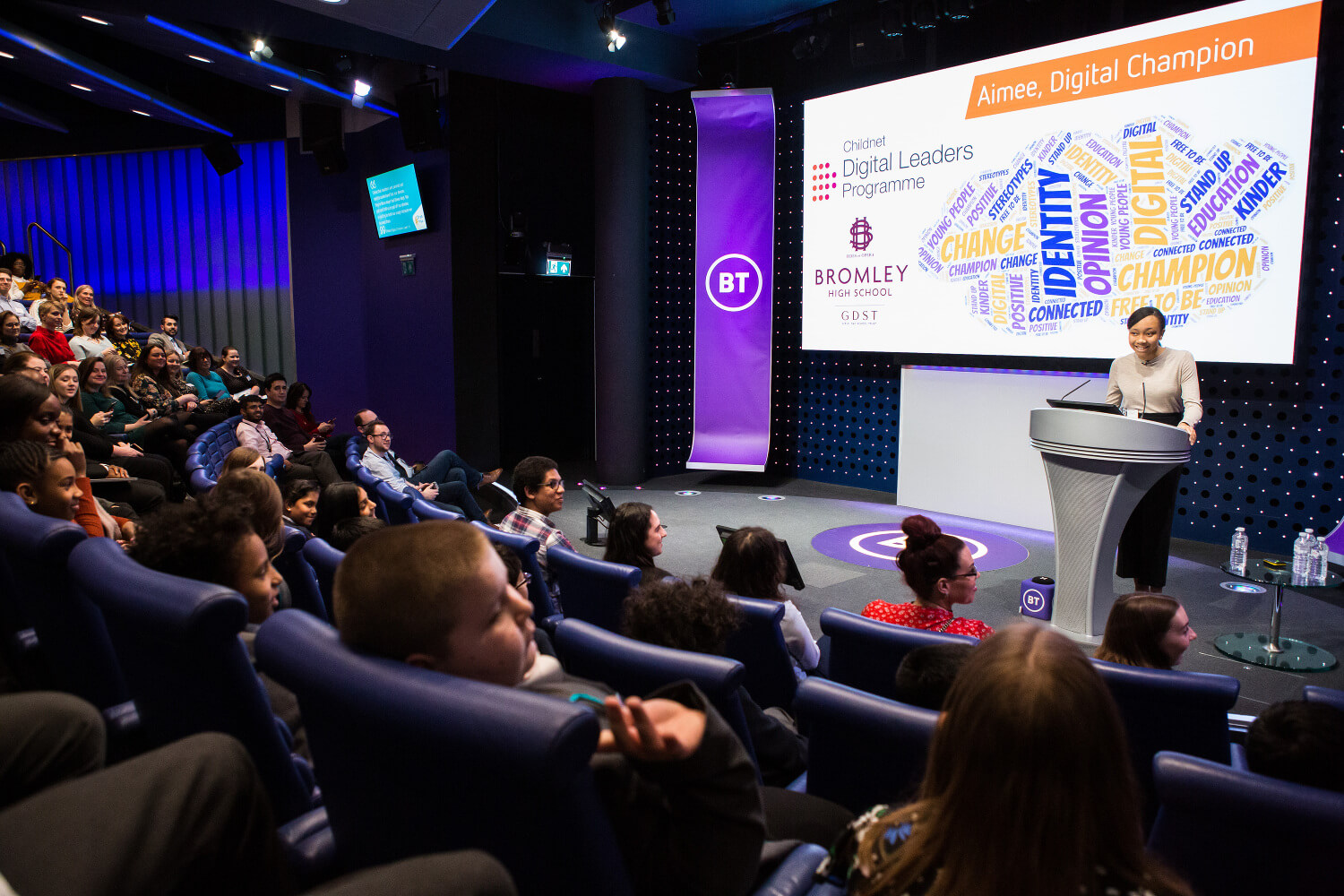 An image showcasing a person speaking at the conference